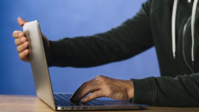Close up of hacker typing