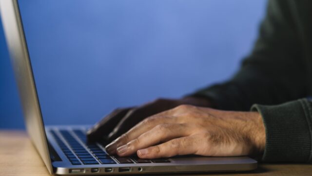 Close up of hacker typing